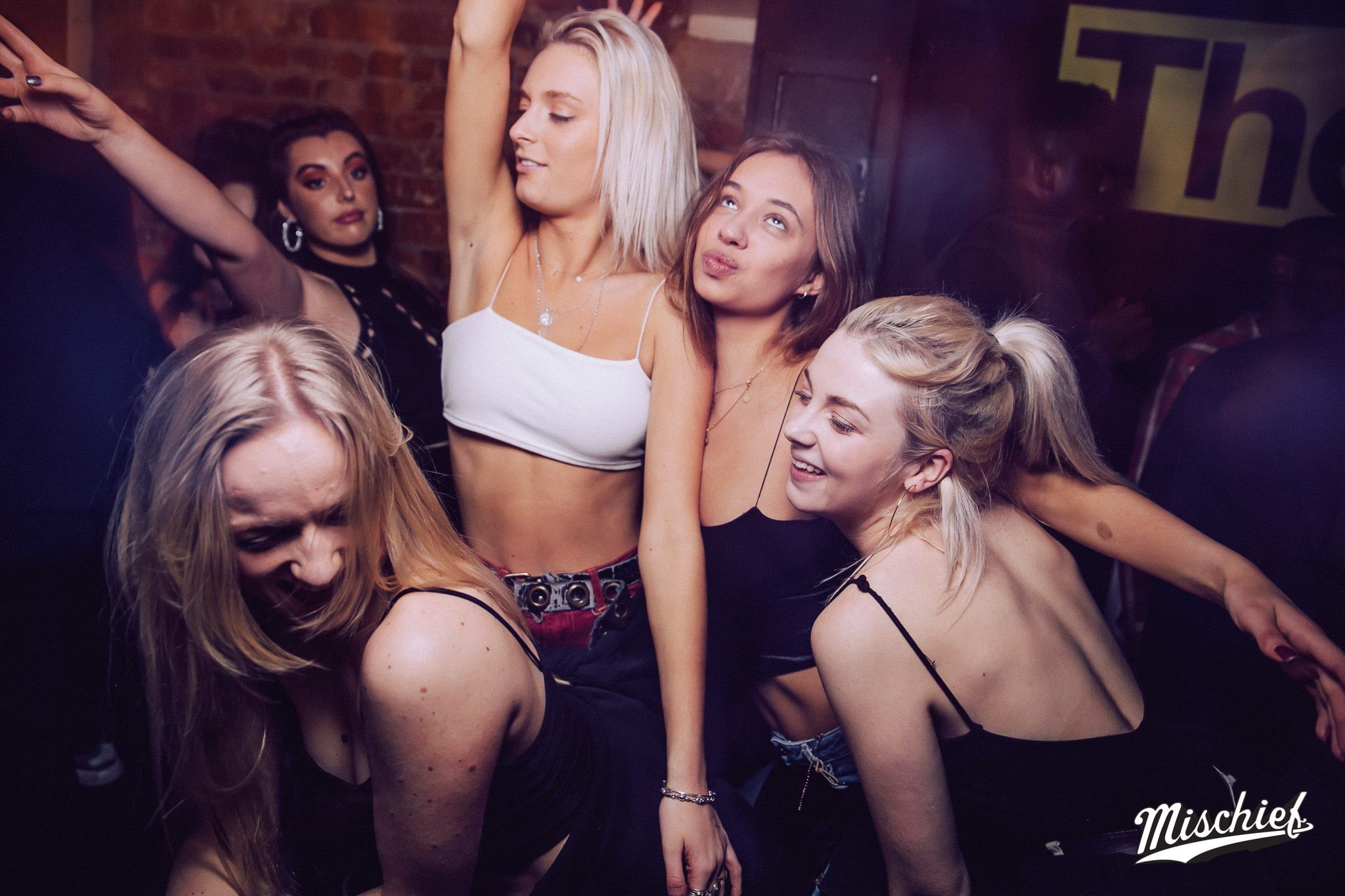 Image may contain: Night Life, Night Club, Club, Underwear, Lingerie, Clothing, Person, People, Human
