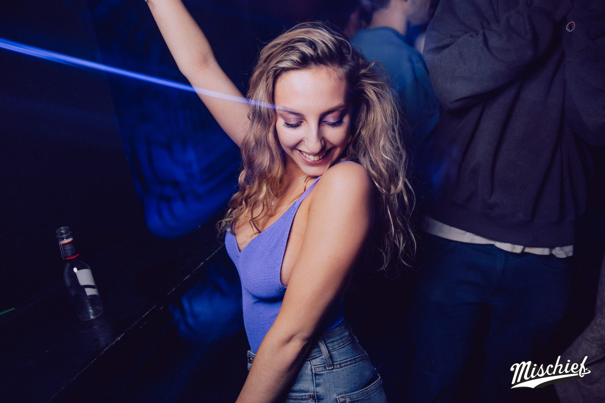 Image may contain: Pants, Jeans, Denim, Clothing, Night Life, Night Club, Club, Person, People, Human