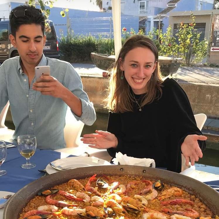 Image may contain: Seafood, Pizza, Food, Person, People, Human