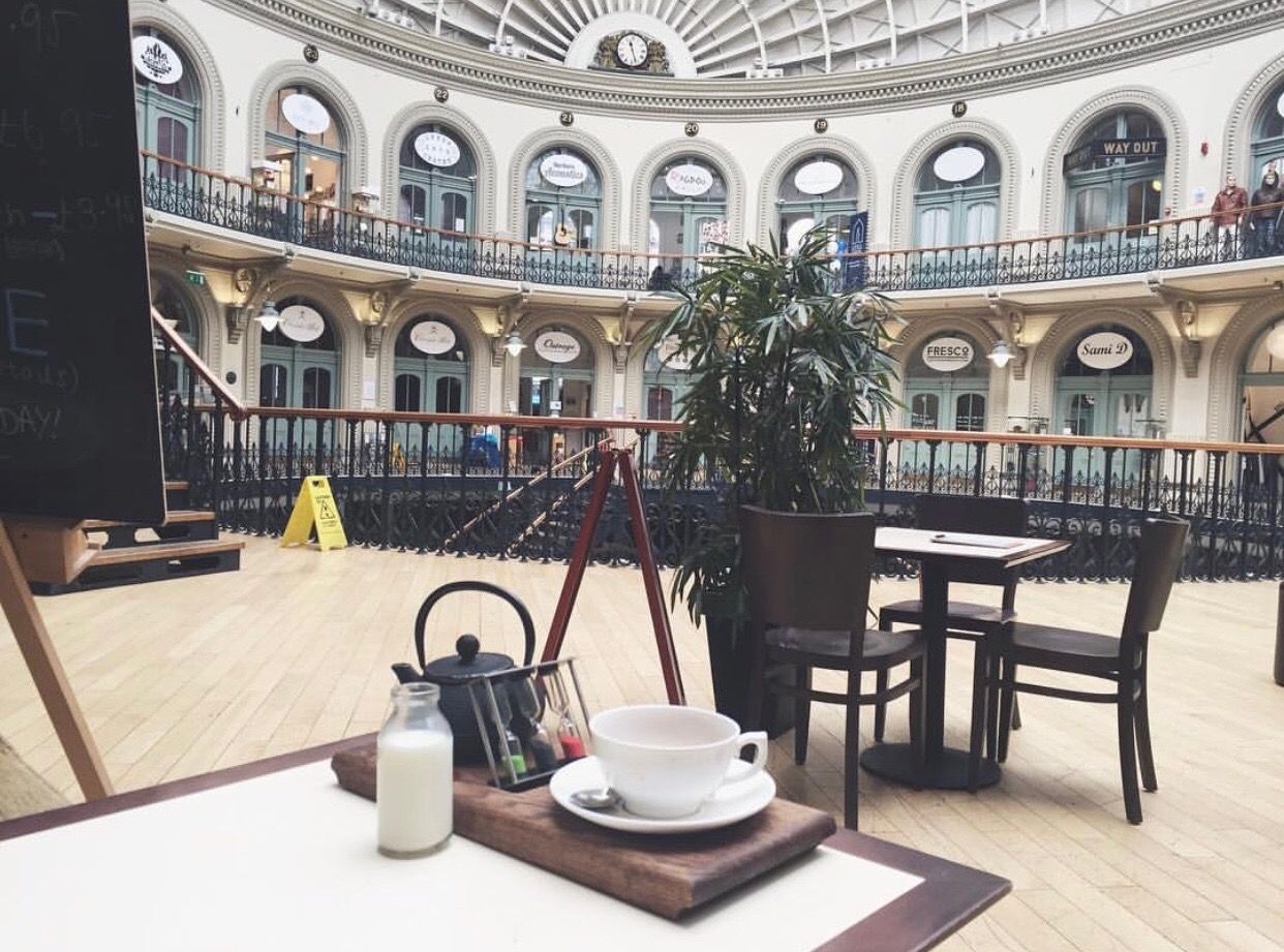 Image may contain: Wood, Plywood, Milk, Drink, Dairy, Beverage, Restaurant, Cafe, Chair, Table, Furniture, Dining Table, Vase, Pottery, Potted Plant, Plant, Jar, Flora