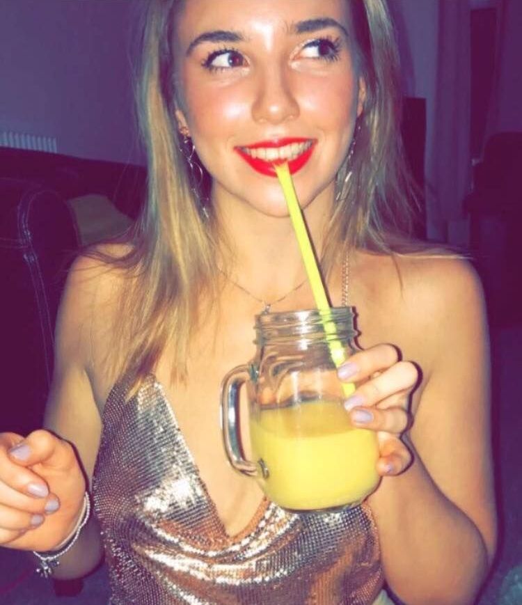 Image may contain: Cocktail, Alcohol, Lemonade, Woman, Girl, Female, Blonde, Drink, Beverage, Person, People, Human