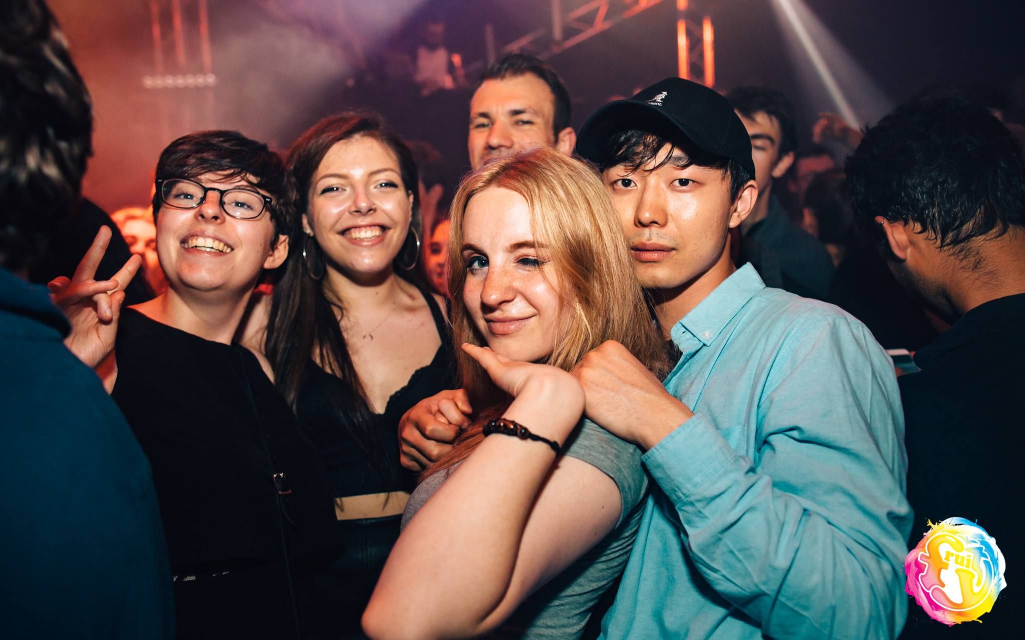 Image may contain: Sweets, Lollipop, Food, Confectionery, Candy, Back, Crowd, Night Life, Night Club, Club, Person, People, Human