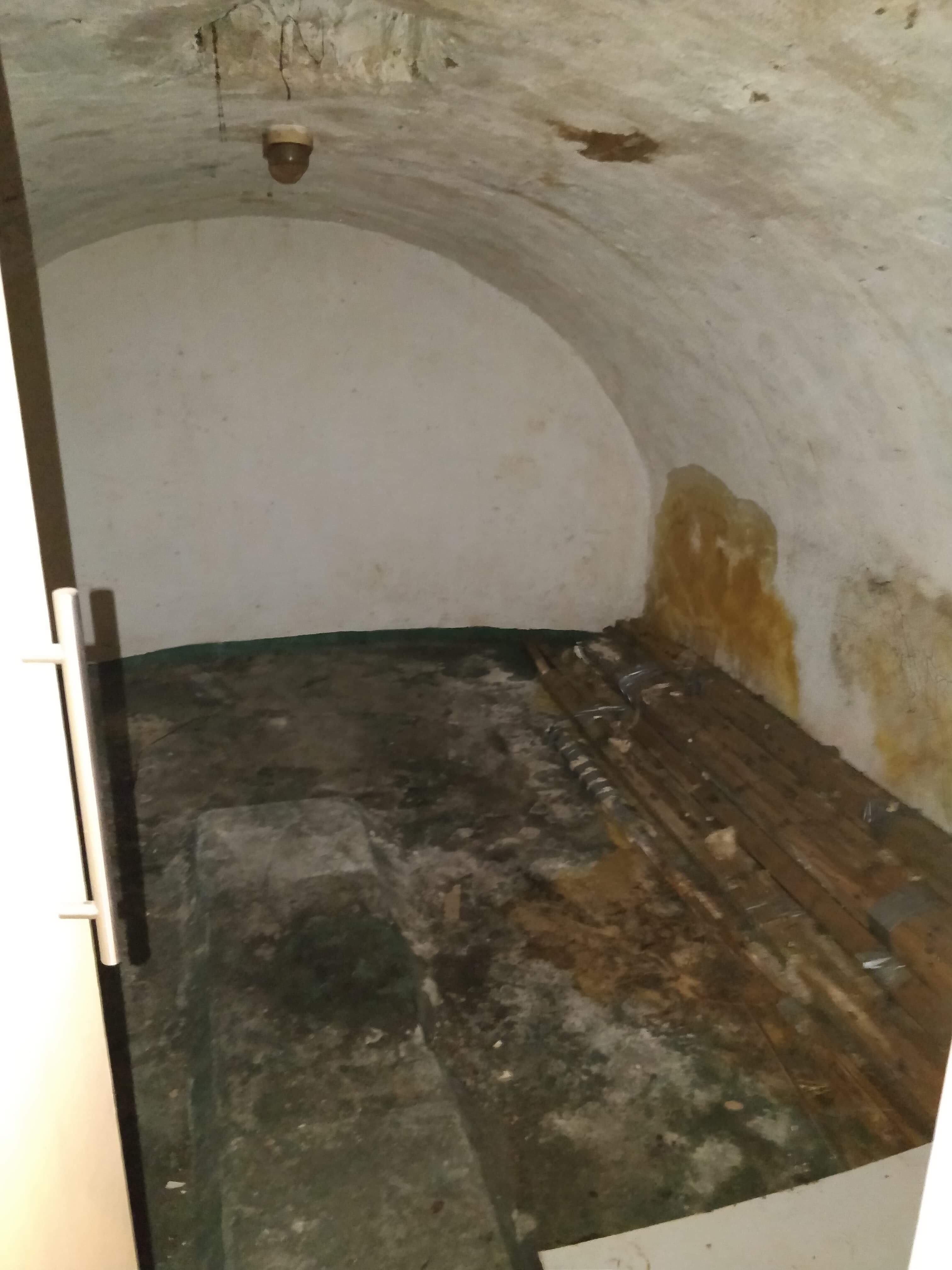 Image may contain: Floor, Crypt, Flooring, Dungeon