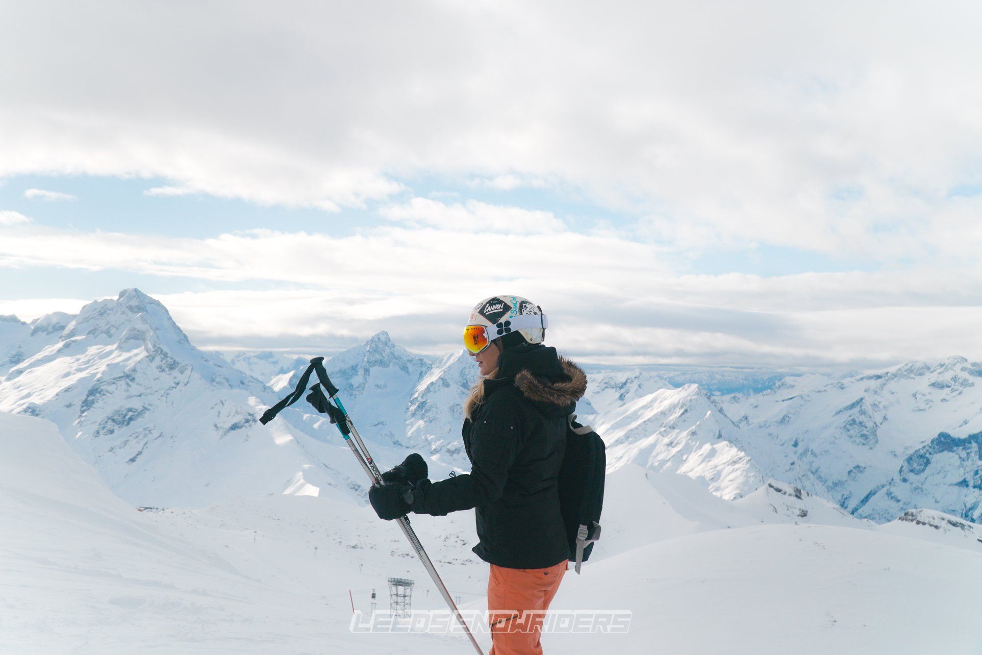 Image may contain: Skiing, Ice, Peak, Mountain Range, Sports, Piste, Sport, Mountain, Snow, Apparel, Clothing, Helmet, Human, Person, Outdoors, Nature