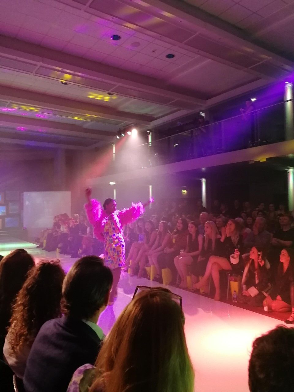 Image may contain: Interior Design, Indoors, Disco, Night Life, Crowd, Audience, Night Club, Club, Person, Human