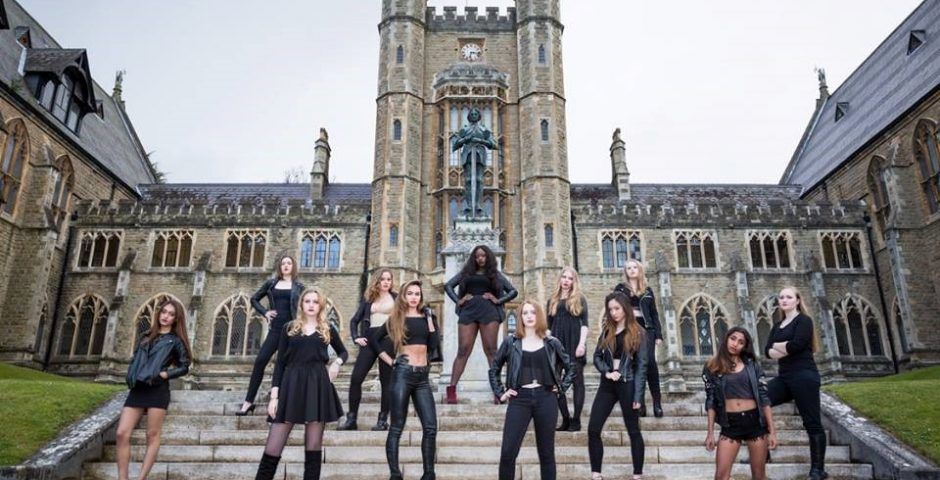 Image may contain: College, Woman, Tourist, Vacation, House, Housing, Mansion, Palace, Bell Tower, Tower, Cathedral, Church, People, Female, Architecture, Building, Denim, Jeans, Pants, Apparel, Clothing, Human, Person