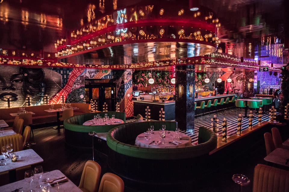 Image may contain: Bar Counter, Arcade Game Machine, Pub, Furniture, Chair, Lighting