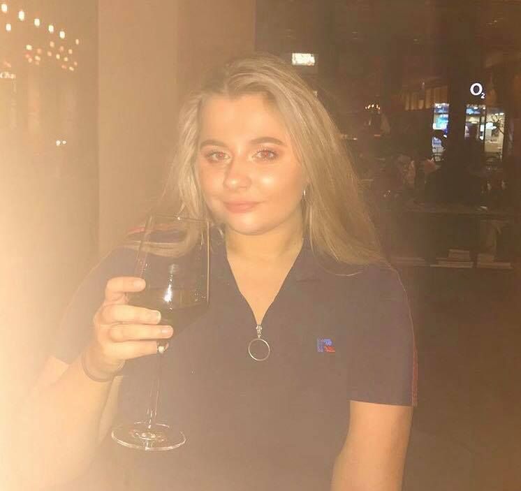 Image may contain: Apparel, Clothing, Bar Counter, Pub, Child, Teen, Blonde, Girl, Kid, Portrait, Photography, Photo, Drinking, Glass, Alcohol, Woman, Drink, Beverage, Female, Face, Human, Person