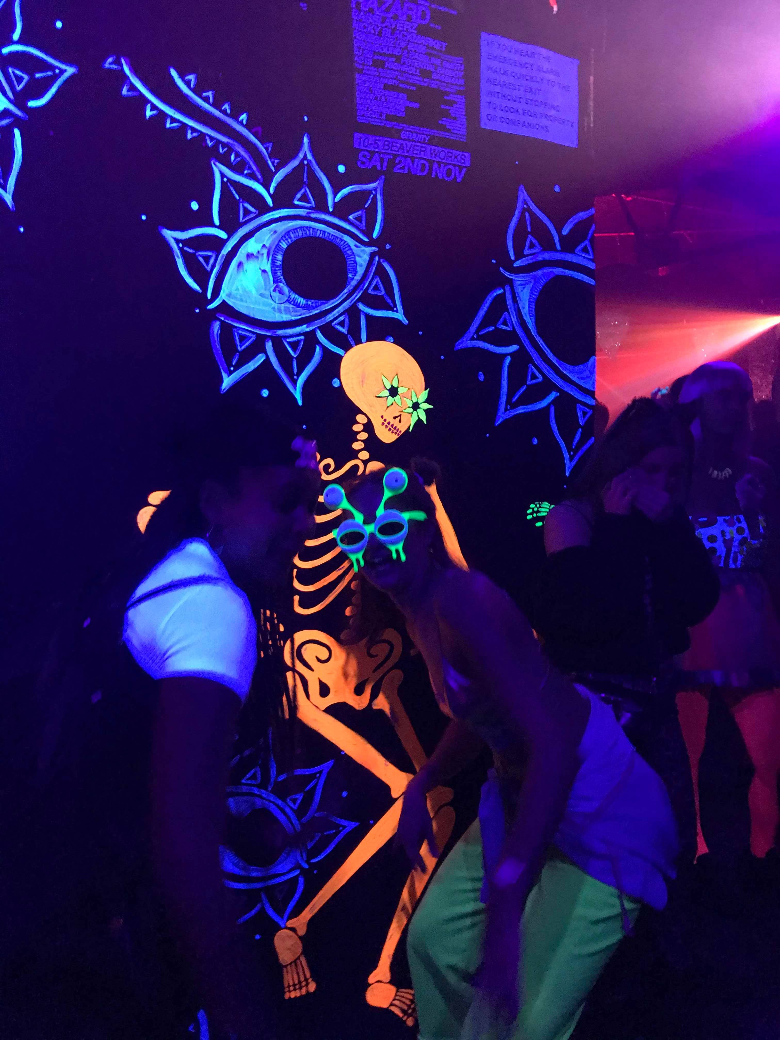 Image may contain: Light, Night Club, Night Life, Person, Human, Club