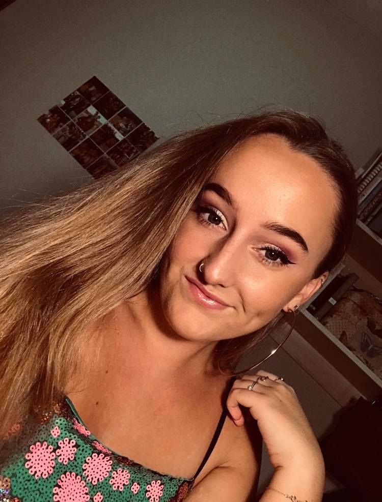 Image may contain: Photography, Photo, Portrait, Female, Smile, Face, Person, Human
