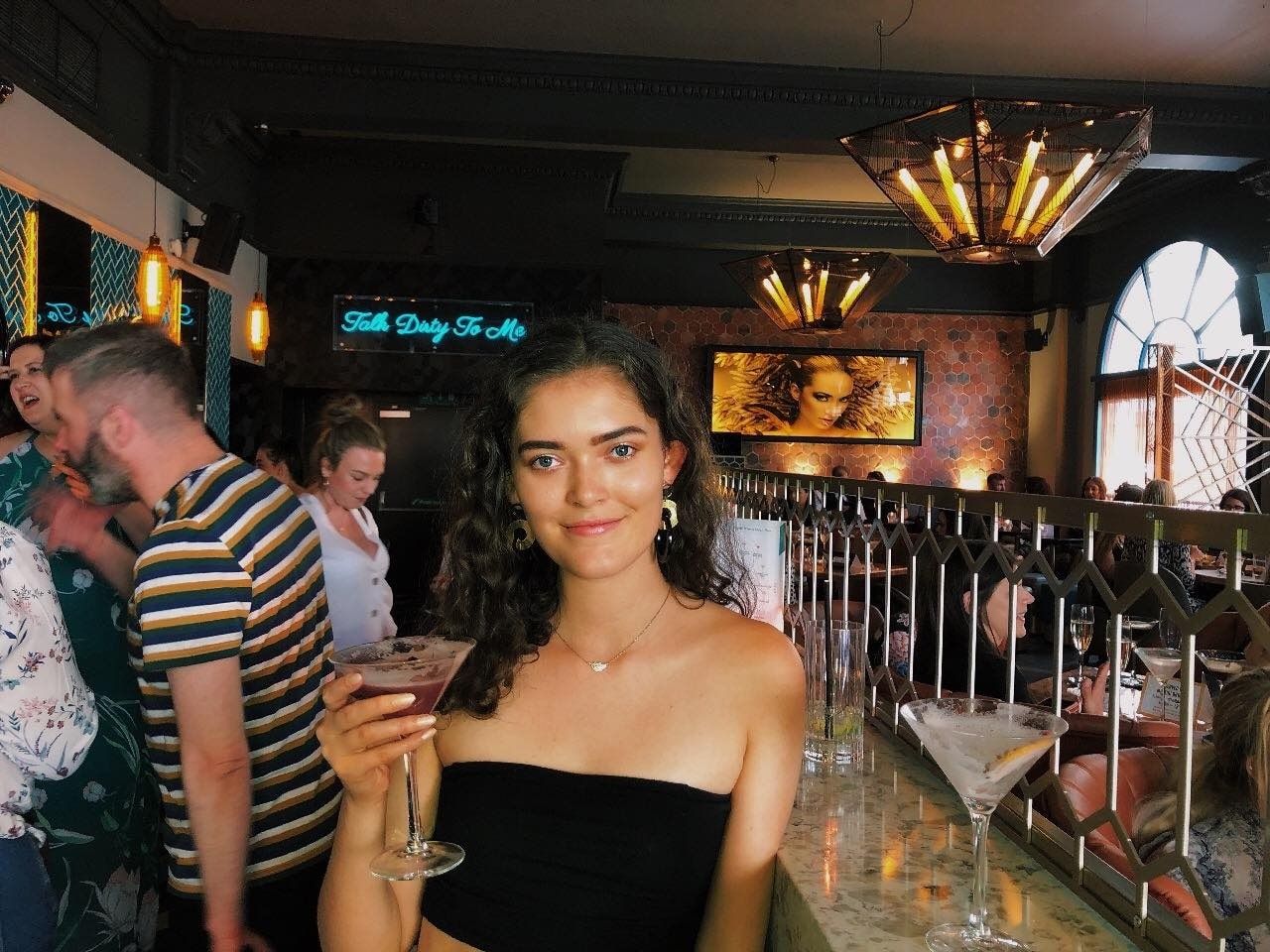 Image may contain: Worker, Glass, Night Life, Night Club, Club, Human, Person, Bar Counter, Pub