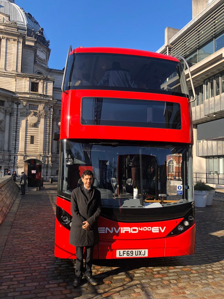 Image may contain: Double Decker Bus, Tour Bus, Human, Person, Transportation, Bus, Vehicle