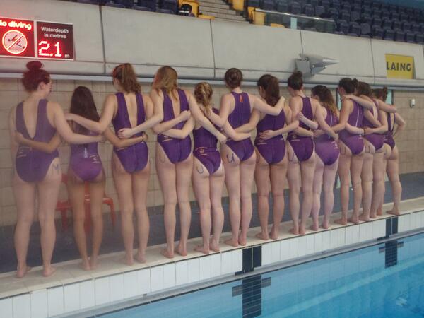 'The cheek of it!' Manchester's victorious water polo team pose for pictures.