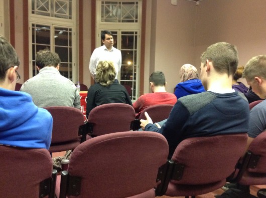Twigg looking serious during a conspiracy theorist's rant