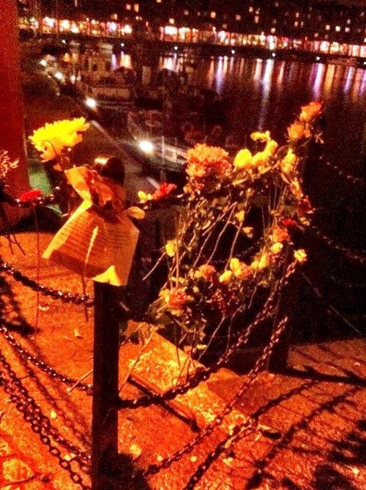 Floral and written tributes have begun to appear at the Albert Dock