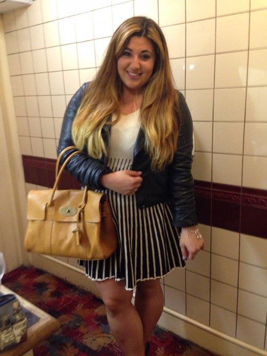 Boobielicious babe: Sophie Doyle works her top heavy shape with a darker jacket and a skater skirt. The flicks balance out her awesome rack and a V-line top subtly shows some cleavage. Work it honey!