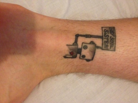 My same housemate's much less regretted tattoo; a lyric from his and his boo’s song.