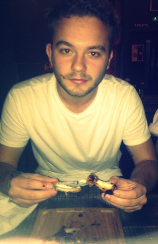He's got BBQ sauce on his face and he couldn't give a shit