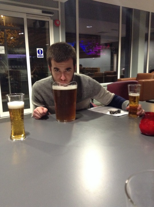 Consuming his favourite drink 
