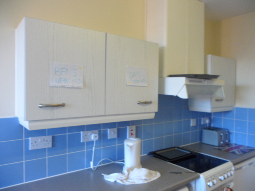 Labelled cupboards a step too far?