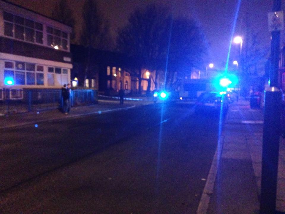 Police are on the scene at Holmes Road