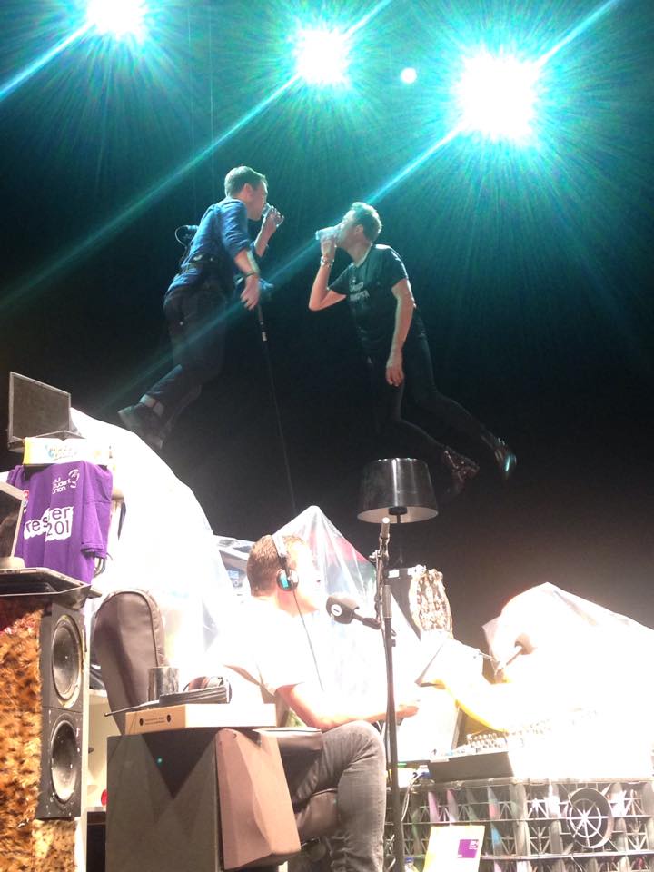 Chris and Grimmy suspended from a harness in Innuendo Bingo