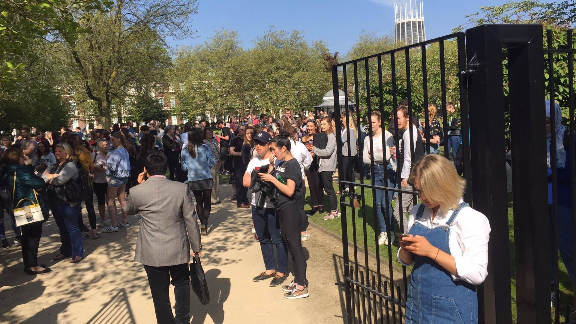 Students waiting in the sun for re-entry