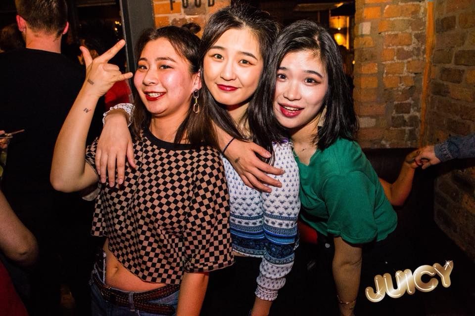 Image may contain: Smile, Portrait, Face, Party, Furniture, Couch, Person, People, Human
