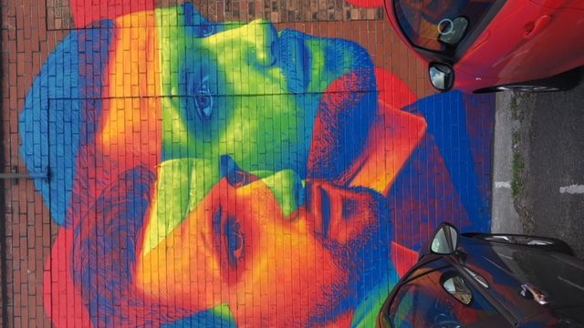 Image may contain: Brick, Graffiti, Motorcycle, Vehicle, Transportation, Car, Automobile