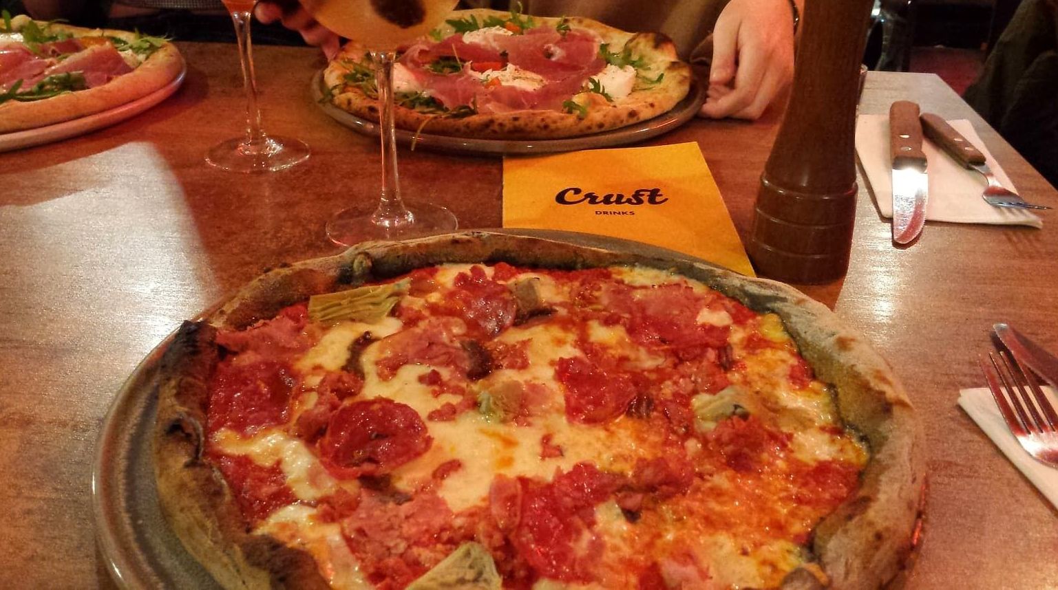 Image may contain: Glass, Bottle, Pizza, Food