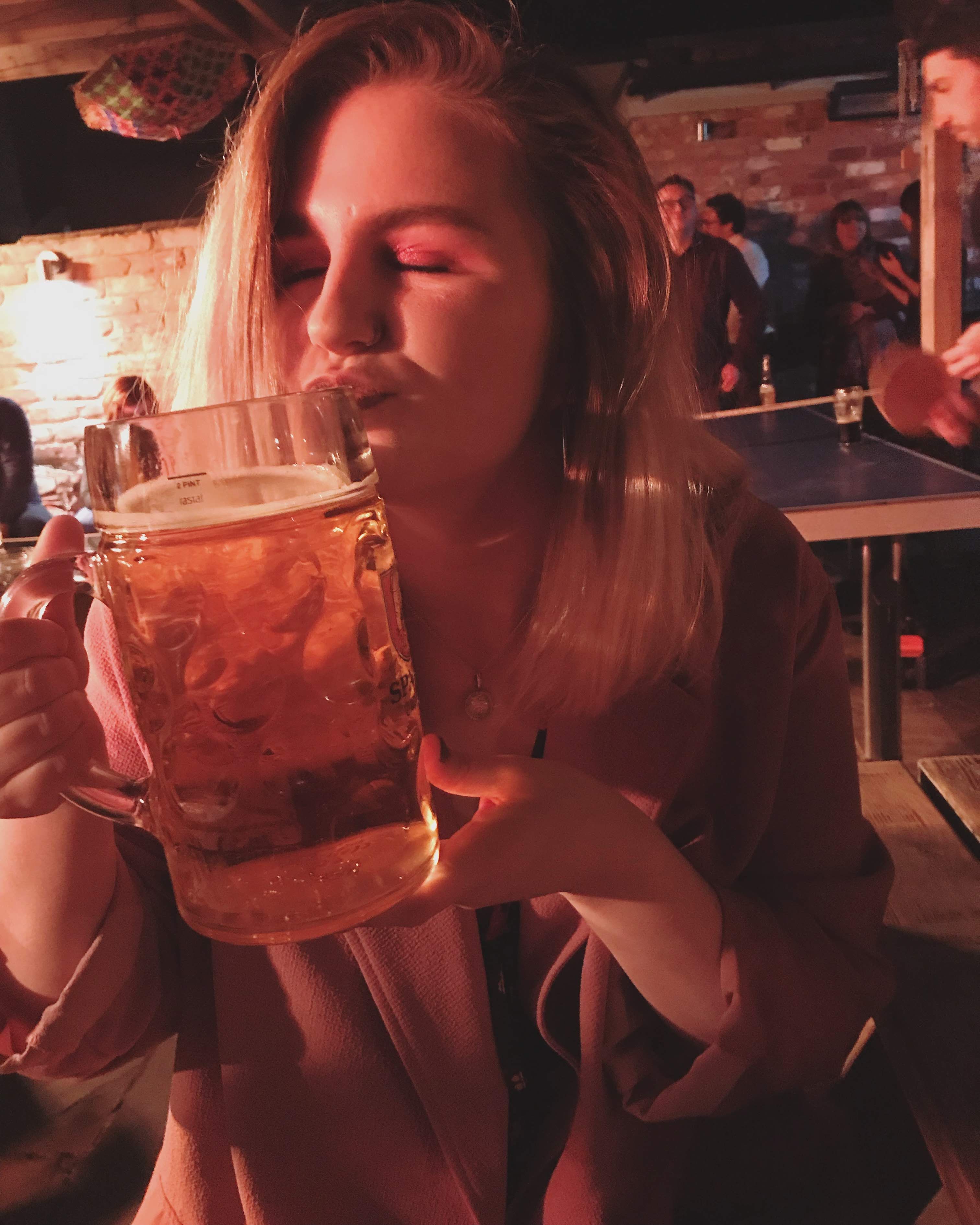 Image may contain: Glass, Drink, Beverage, Beer Glass, Beer, Alcohol, Make Out, Night Life, Person, People, Human