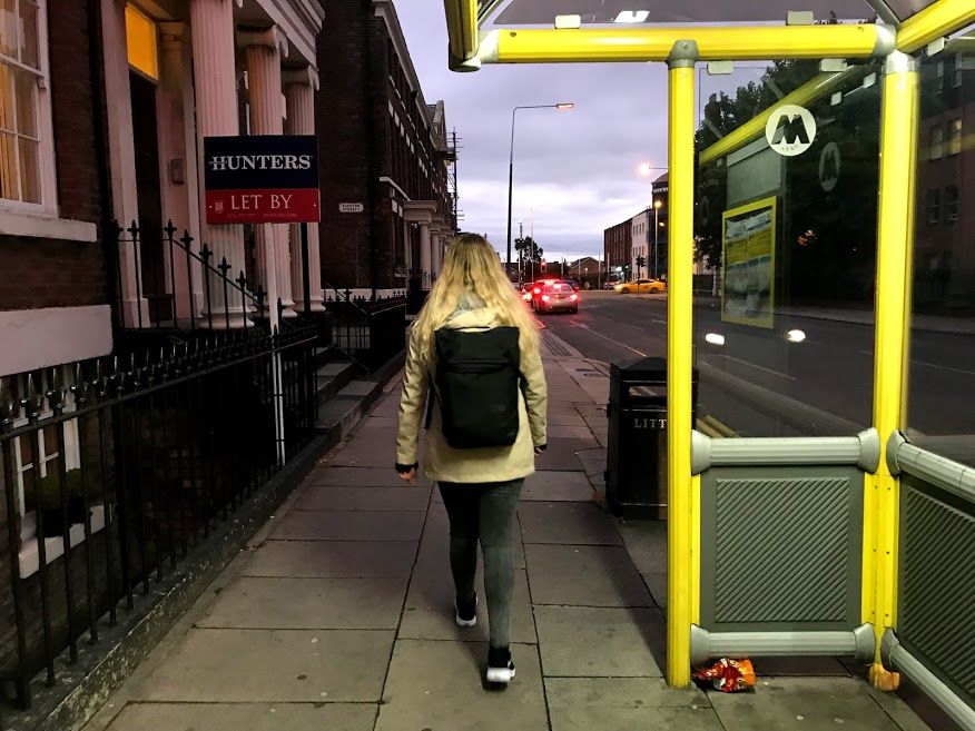 Image may contain: Handrail, Banister, Vehicle, Transportation, Train, Walkway, Sidewalk, Pavement, Path, Person, People, Human