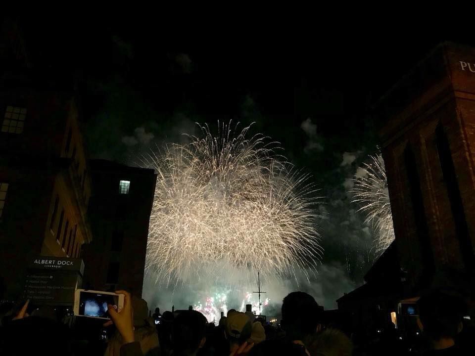 Image may contain: Person, Human, Festival, Crowd, Outdoors, Night, Fireworks