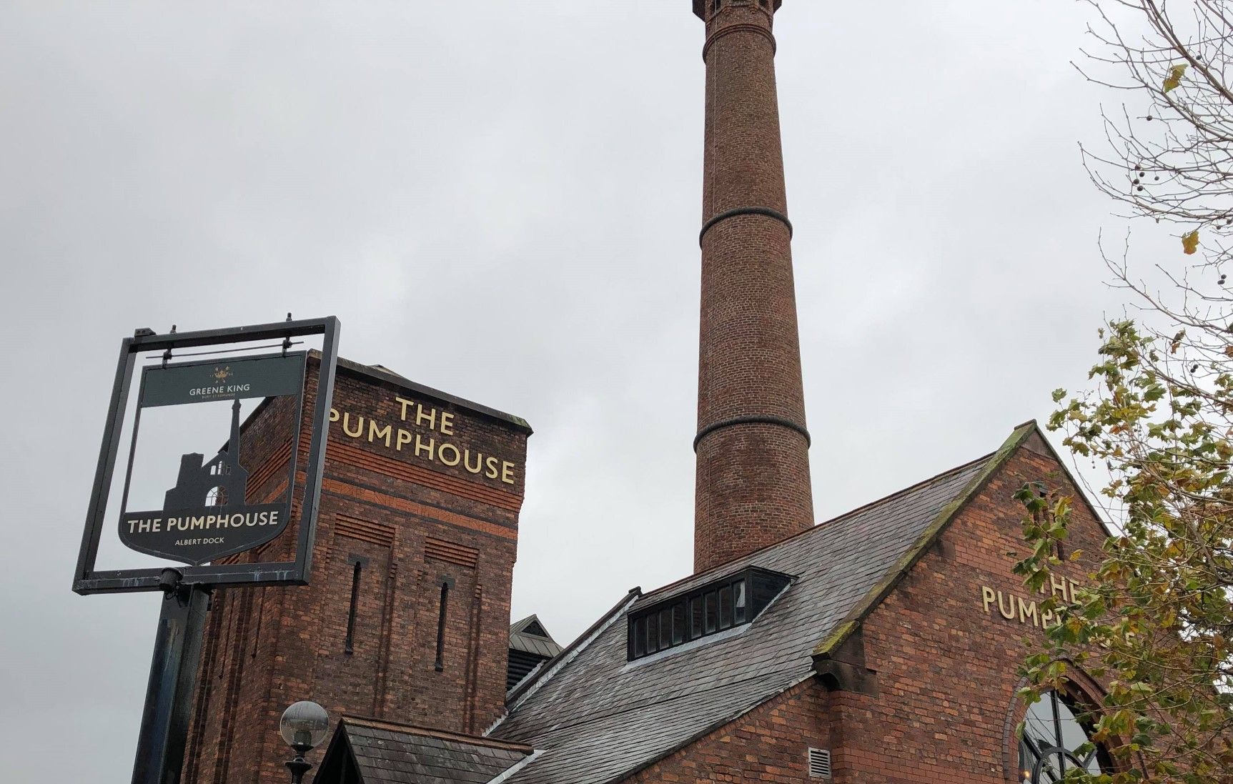 Image may contain: Factory, Architecture, Roof, Brick, Building