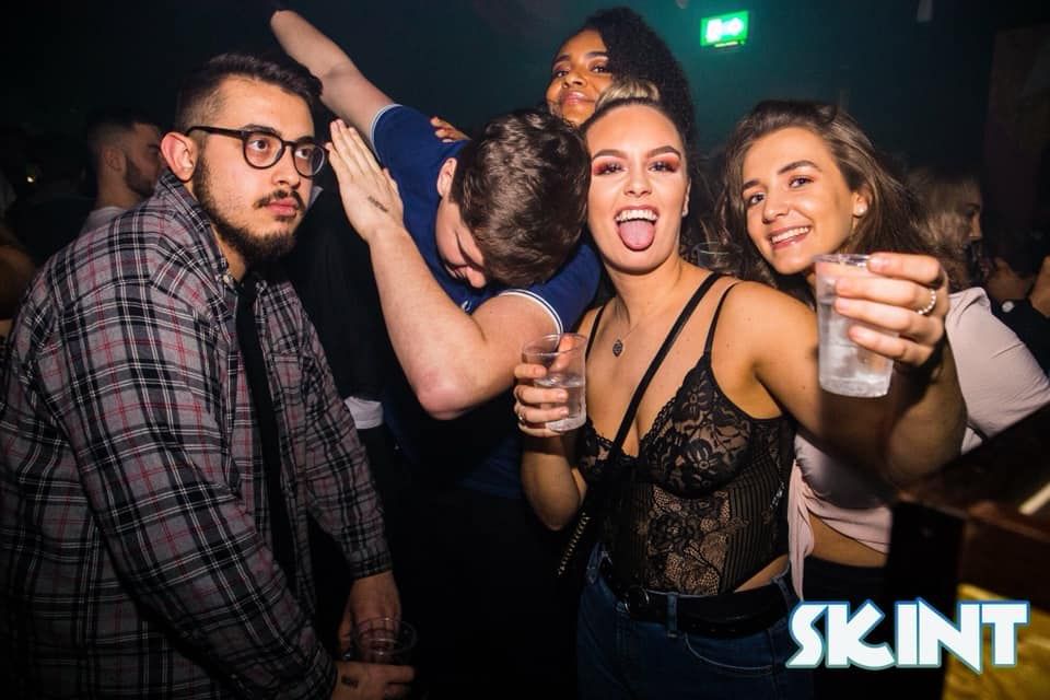 Image may contain: Glasses, Accessory, Accessories, Drink, Beverage, Night Life, Night Club, Club, Person, Human, Party