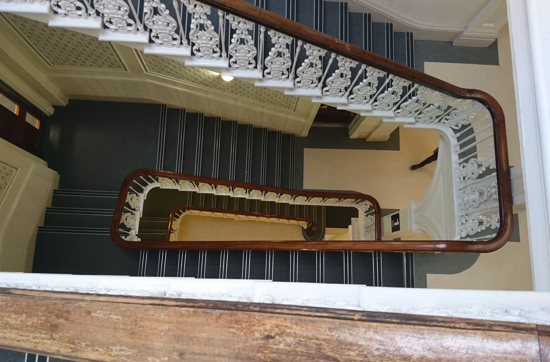 Image may contain: Wood, Staircase, Handrail, Banister