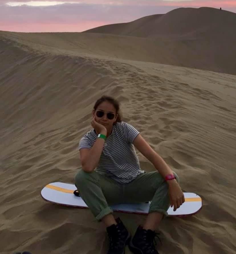 Image may contain: Sport, Sports, Sea Waves, Dune, Apparel, Clothing, Shoe, Footwear, Person, Human, Water, Sea, Ocean, Accessory, Sunglasses, Accessories, Sand, Outdoors, Nature, Soil