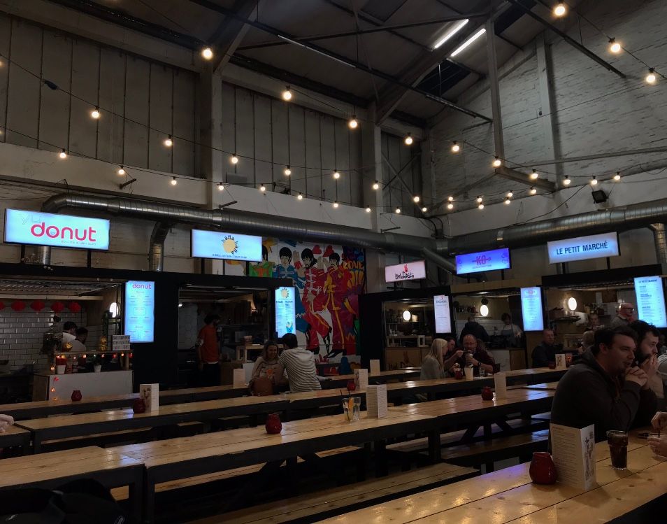 Image may contain: Wood, Food, Food Court, Cafeteria, Person, Human, Restaurant