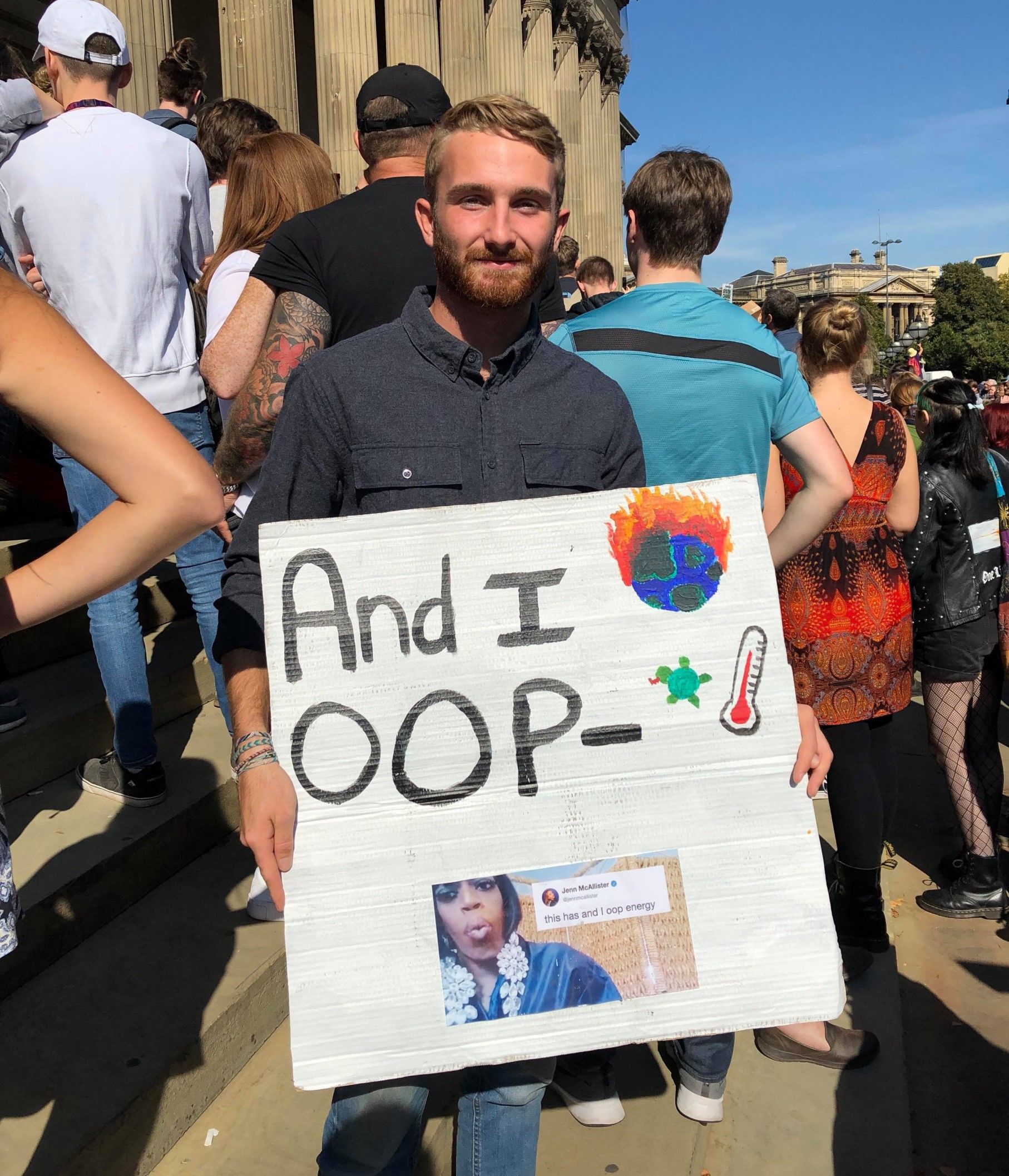 Image may contain: Crowd, Shoe, Footwear, Clothing, Apparel, Banner, Word, Text, Human, Person