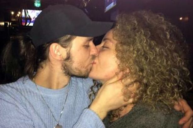 Image may contain: Kiss, Kissing, Dating, Cap, Baseball Cap, Clothing, Hat, Apparel, Face, Hair, Make Out, Person, Human