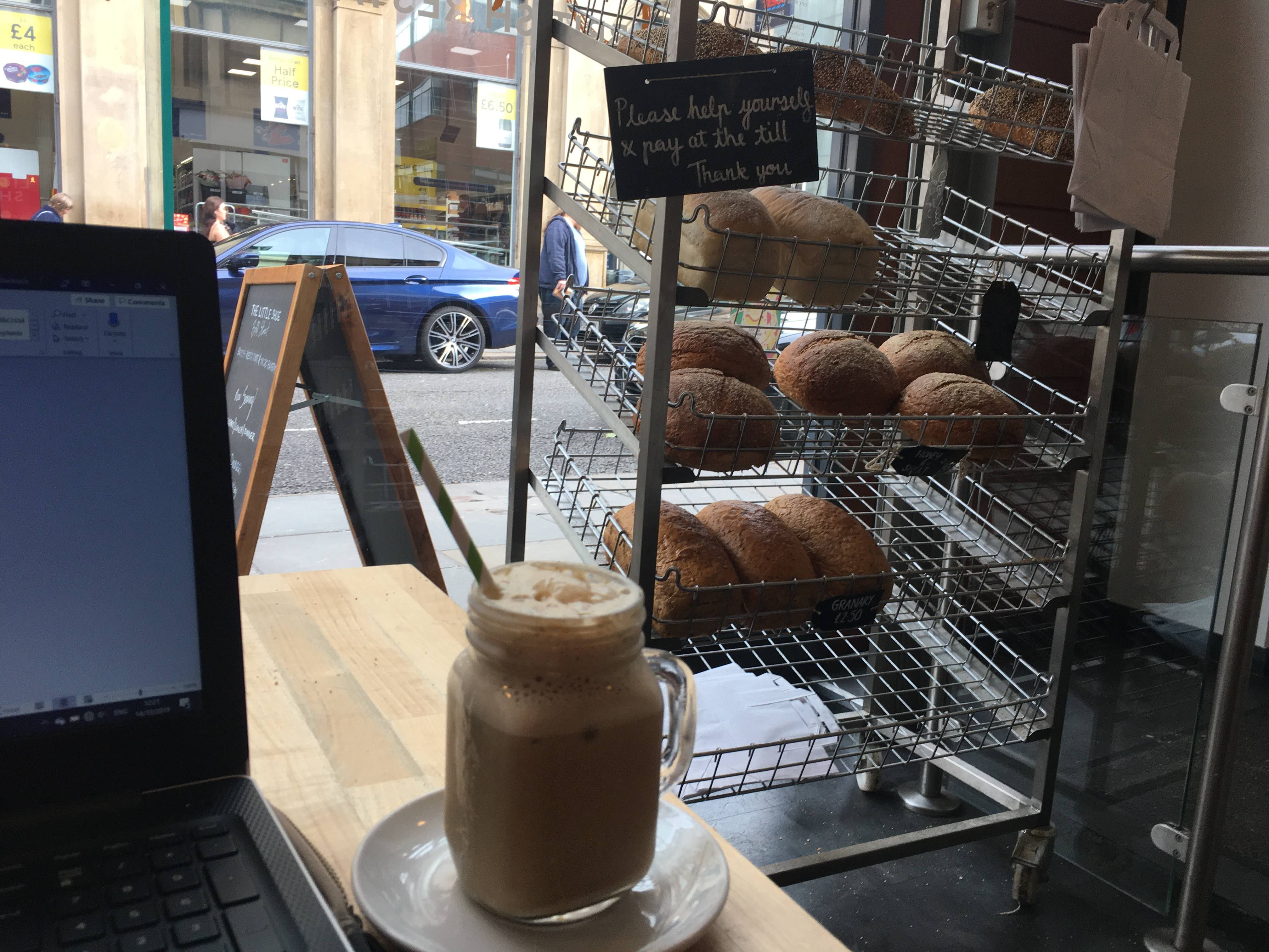Image may contain: Machine, Wheel, Coffee Cup, Cup, Car, Automobile, Transportation, Vehicle, Food, Bread, Person, Human, Juice, Beverage, Drink, Hardware, Computer Keyboard, Computer Hardware, Keyboard, Computer, Laptop, Electronics, Pc