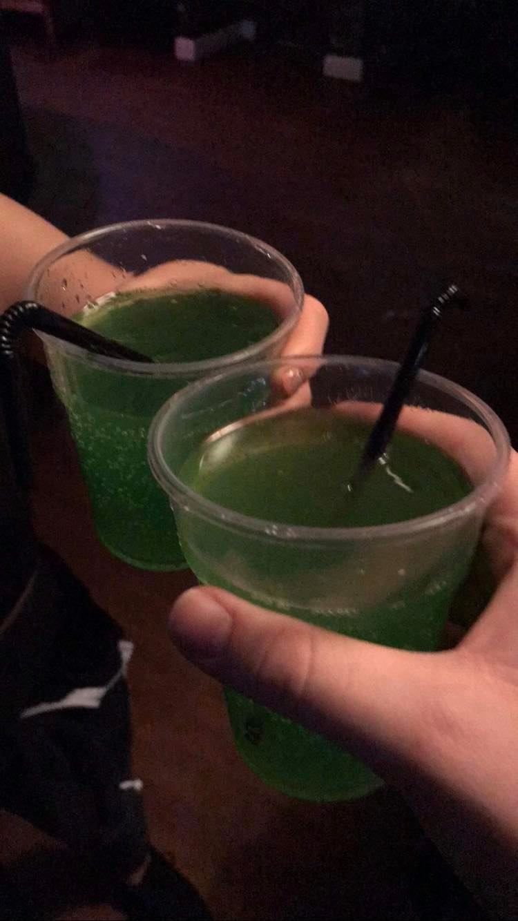 Image may contain: Person, Human, Beverage, Cocktail, Drink, Alcohol