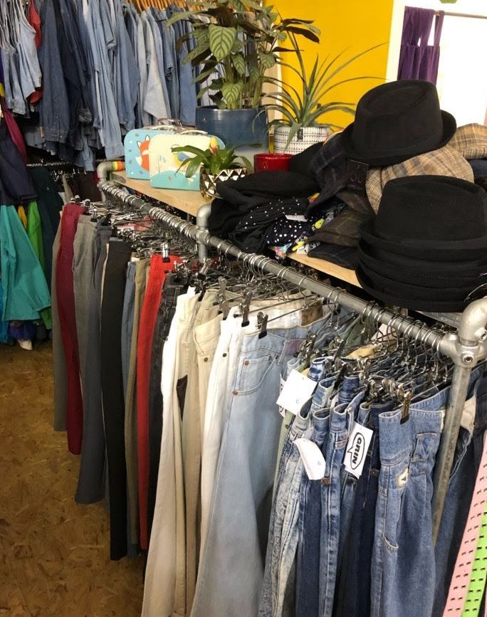 Image may contain: Sun Hat, Hat, Pants, Furniture, Shop, Boutique, Clothing, Apparel