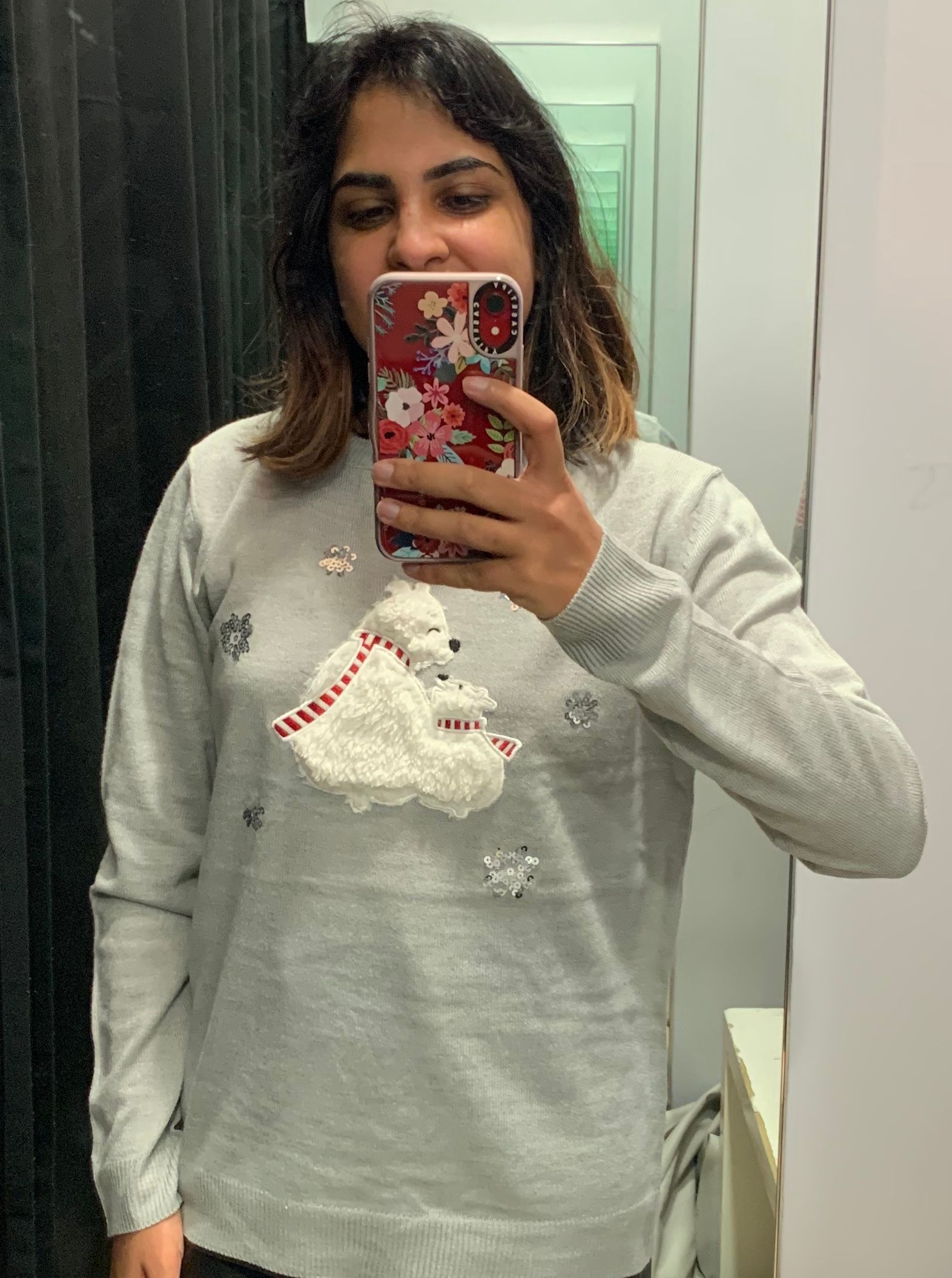 Image may contain: Sweater, Long Sleeve, Human, Person, Sleeve, Home Decor, Apparel, Clothing