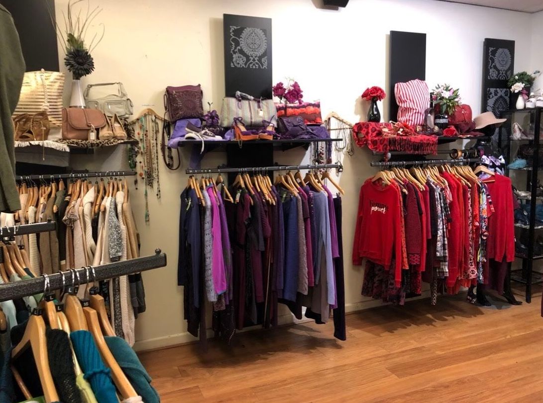 Image may contain: Wood, Interior Design, Indoors, Human, Person, Apparel, Clothing, Boutique, Shop, Furniture