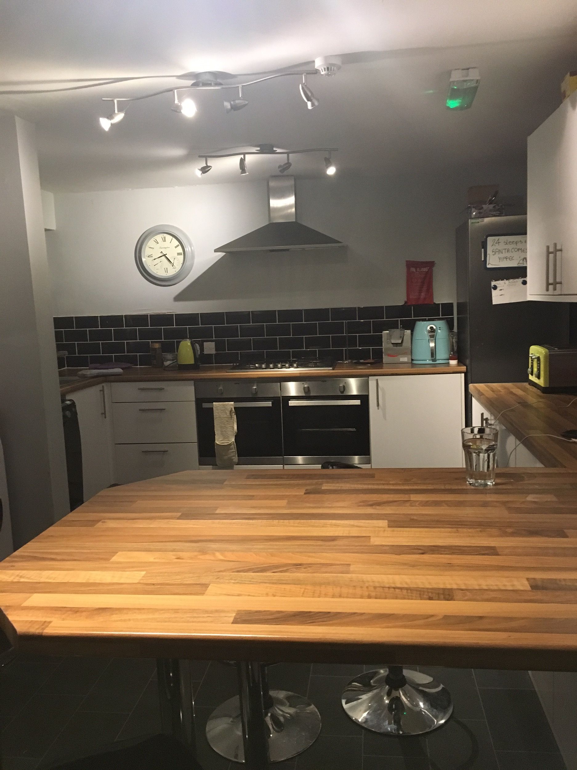 Image may contain: Clock Tower, Building, Architecture, Tower, Kitchen, Floor, Interior Design, Hardwood, Indoors, Room, Wood, Flooring