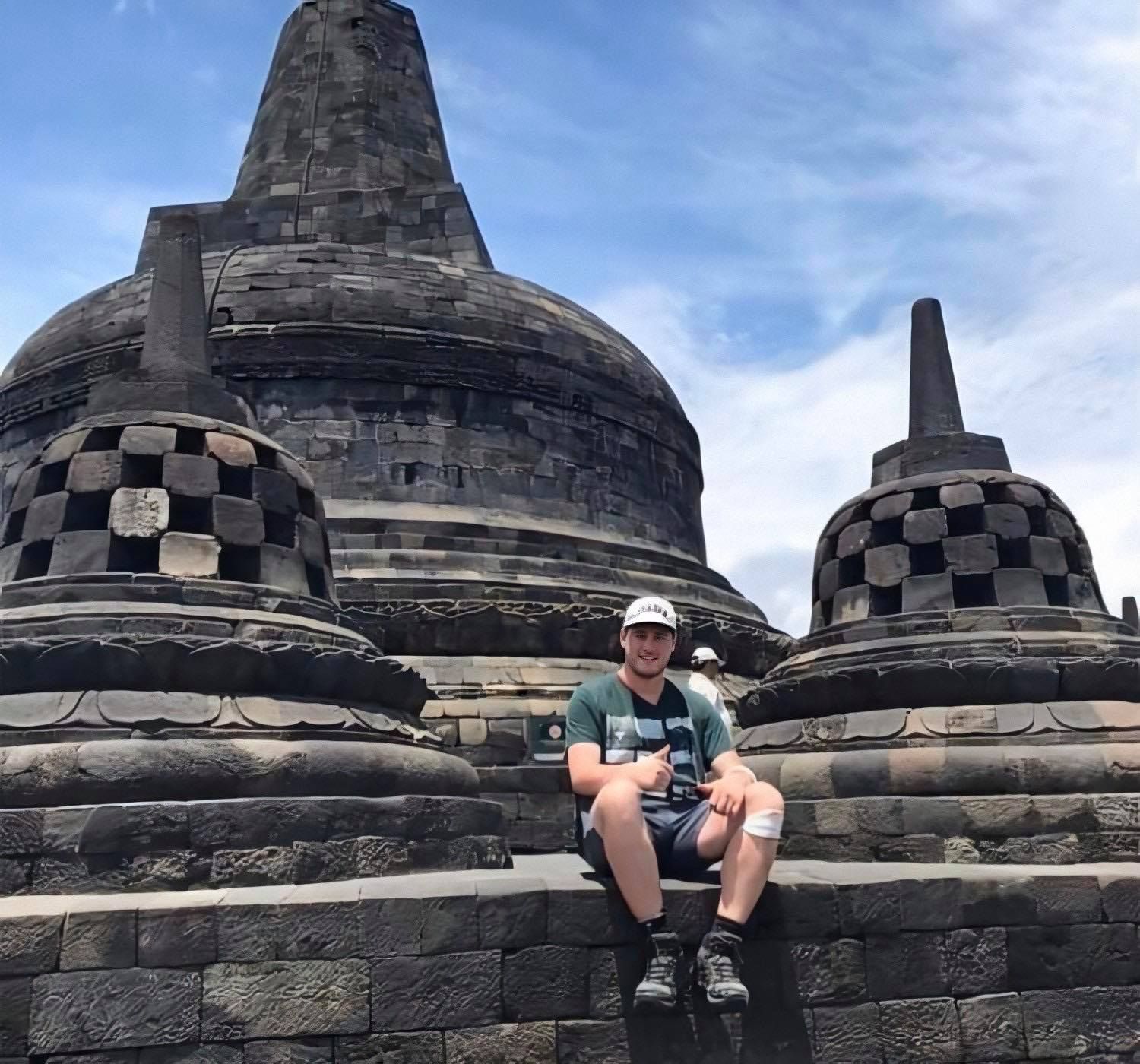 Image may contain: Portrait, Photo, Photography, Monument, Worship, Shrine, Face, Pants, Shorts, Vacation, Temple, Building, Architecture, Shoe, Footwear, Rock, Clothing, Apparel, Person, Human