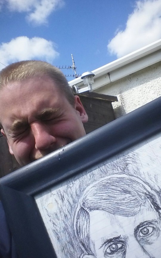 Not Happy: NA Boss Benjamin Raymond Might What Appears To Be A Portrait Of Hitler