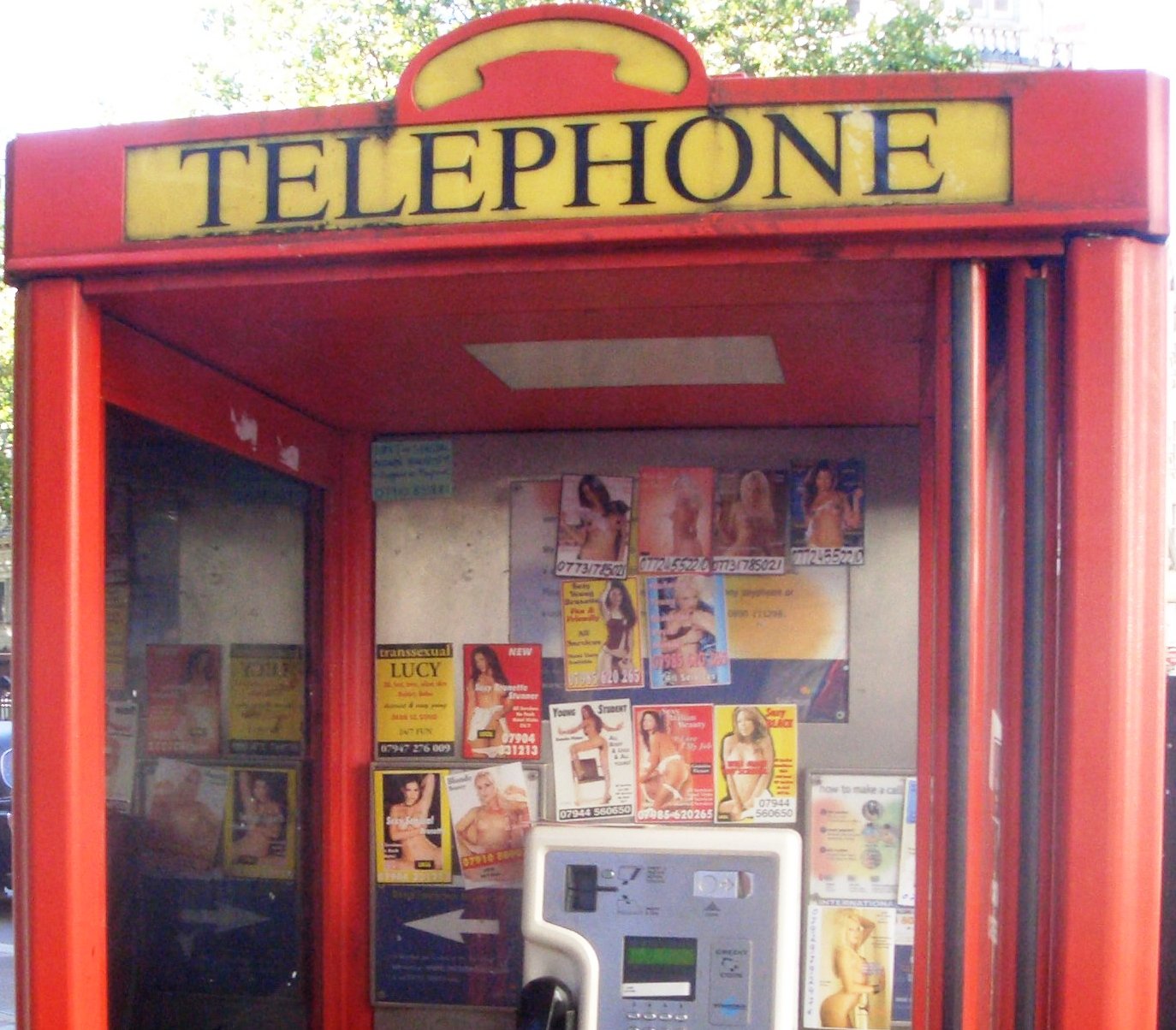 Phone_box_prostitute_calling_cards_1_crop