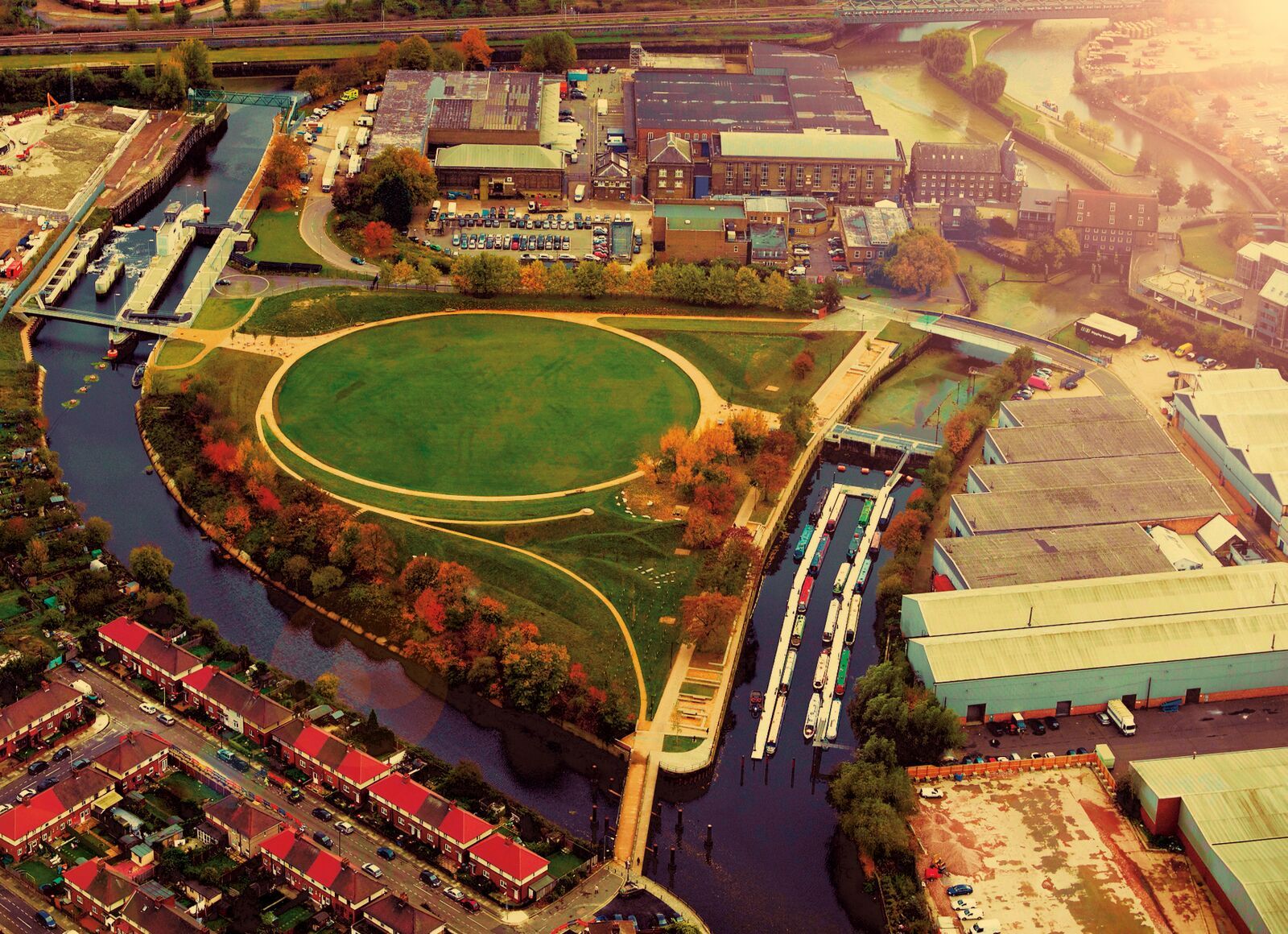 Image may contain: Urban, Town, City, Building, Poster, Collage, Water, Canal, Scenery, Outdoors, Nature, Landscape, Aerial View